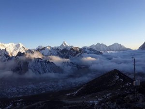 Standing at the base camp of the World's highest mountain in the world