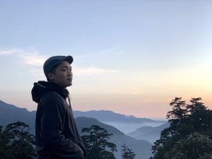 她問我：「為什麼要爬山？」