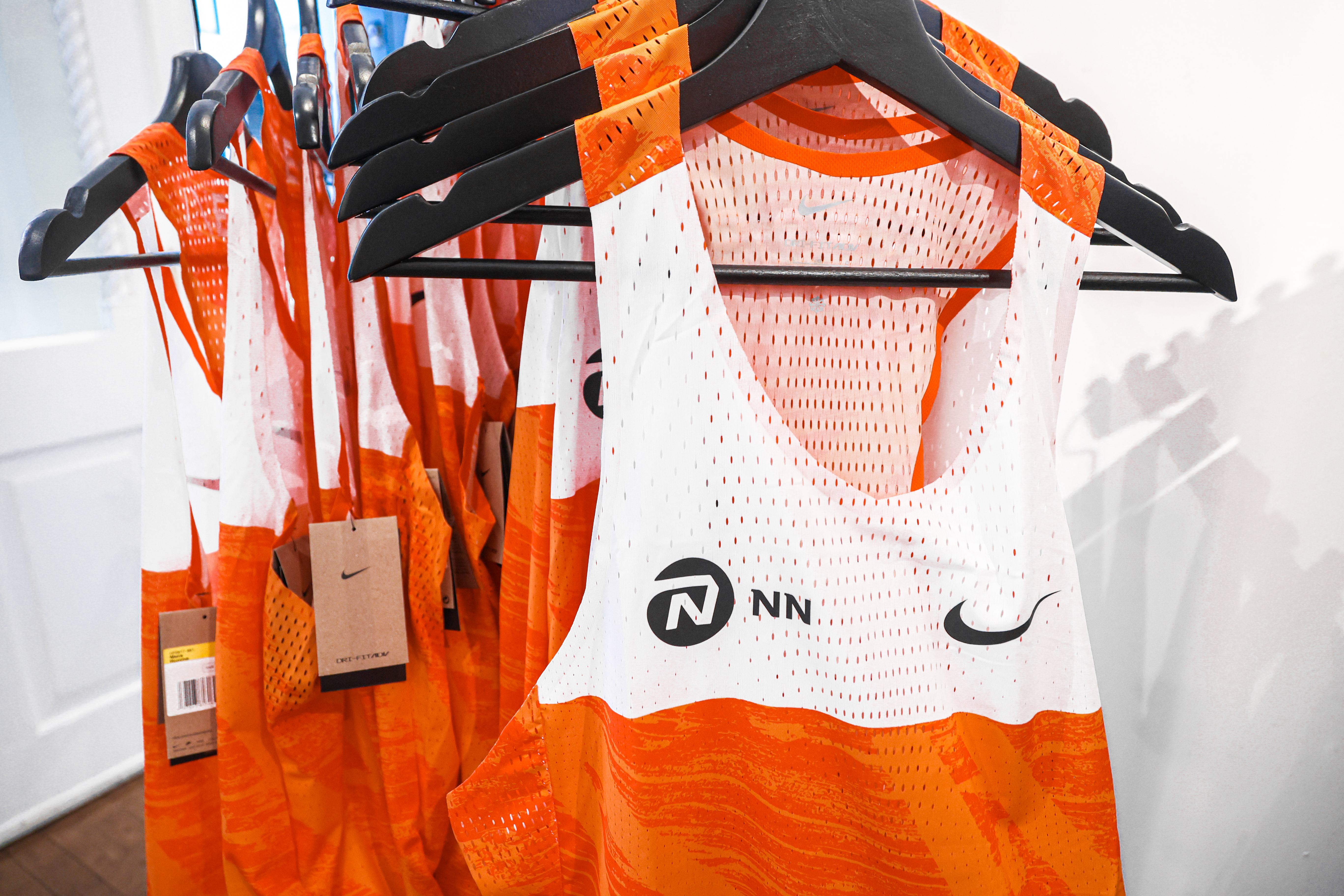 nn running team singlet