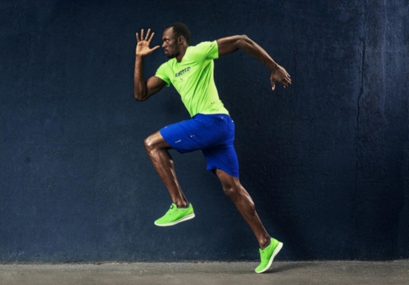 puma ignite disc 问世,电视里播放著世界第一飞人闪电博尔特(usain